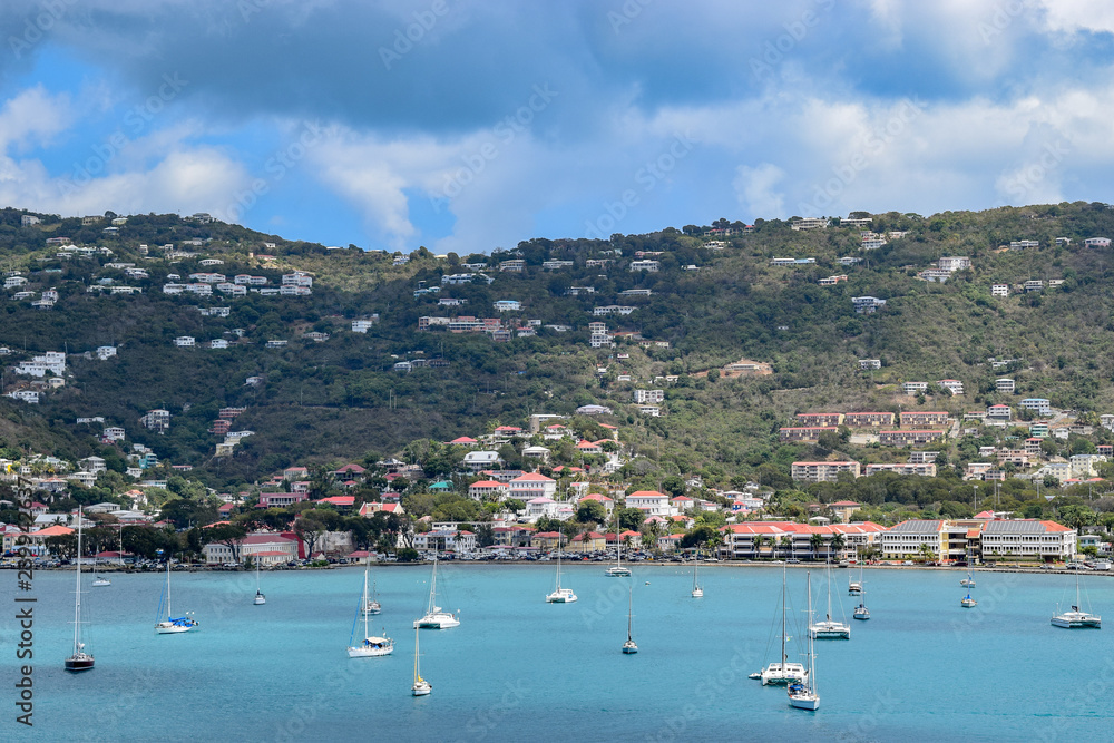 View of mountain landscapes with yachts and sailboats on the ocean in Saint Thomas, US Virgin Islands