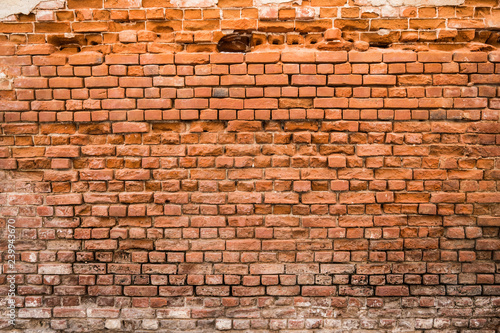 crumbling brick wall