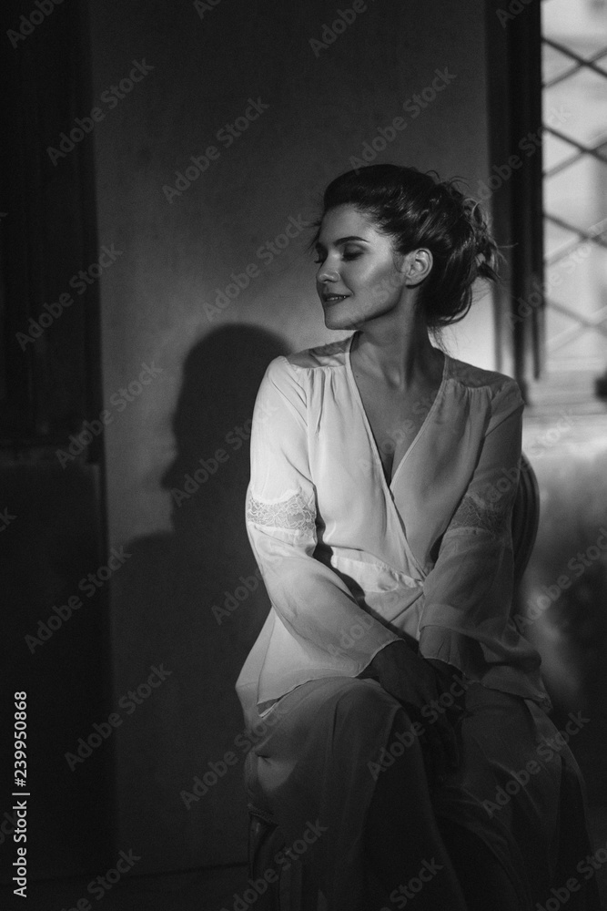 Elegant woman portrait studio shot black and white. Attractive adult brunette sexy girl on black background. Long beautiful healthy hair model girl stock image. Elegant woman portrait studio shot black and white. Attractive adult brunette sexy girl on black background. Long beautiful healthy hair model girl stock image.