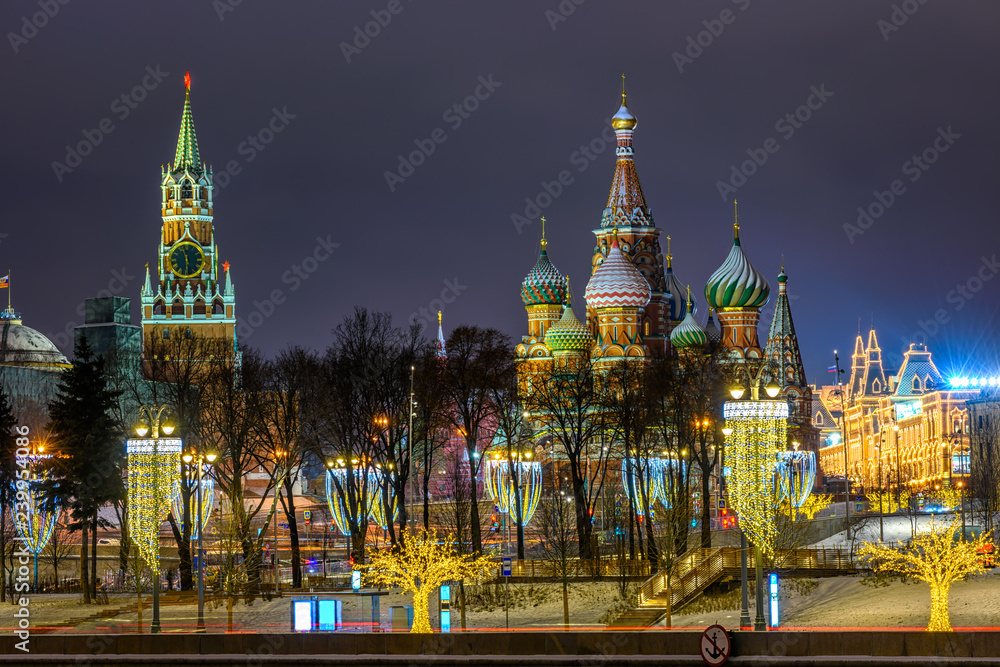 Spasskaya Tower, Moscow Kremlin and Saint Basil s Cathedral in Moscow, Russia. Architecture and landmarks of Moscow. Moscow with Christmas decoration.