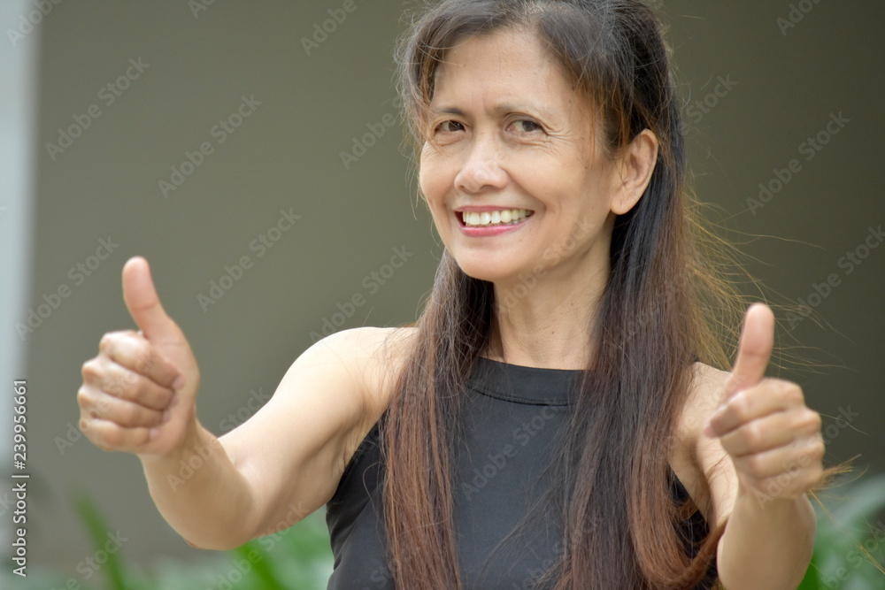 Filipina Female Senior With Thumbs Up Filipina Female Senior With Thumbs Up