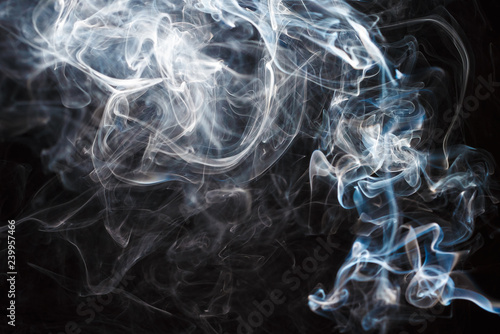 Smoke fragments on a black background