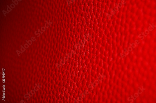 Textured red leather close up