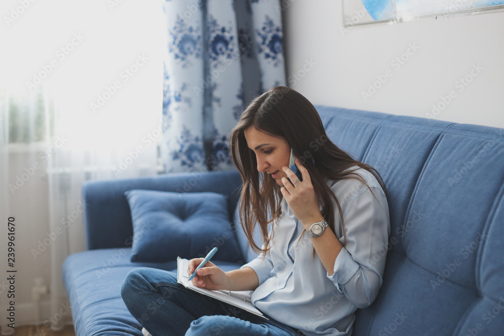 Cute caucasian girl talking on phone in real room Cute caucasian girl talking on phone in real room
