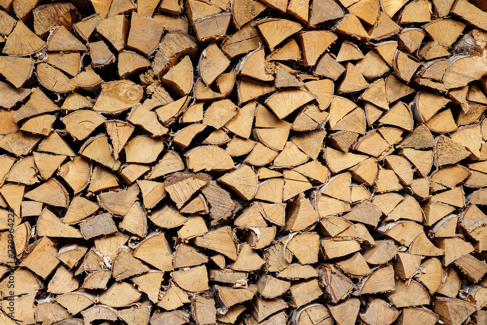 wall firewood, Background of dry chopped firewood logs in a pile wall firewood, Background of dry chopped firewood logs in a pile