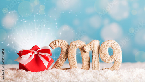 Christmas inscription 2019 and magic box magic in the snow