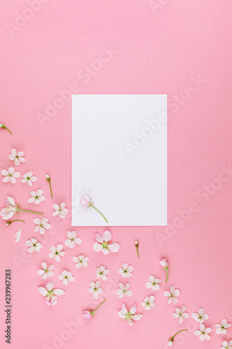 Blank frame mockup with white flowers © dvoevnore