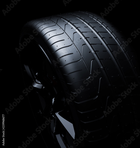 Close up of a tyre on a black background