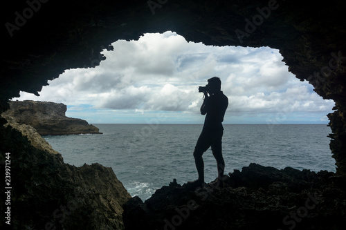 Photographer in animal flower cave barbados