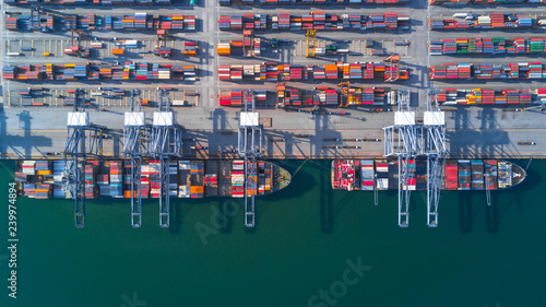 Container ship carrying container for import and export, Aerial view business logistic and freight transportation by ship in open sea.