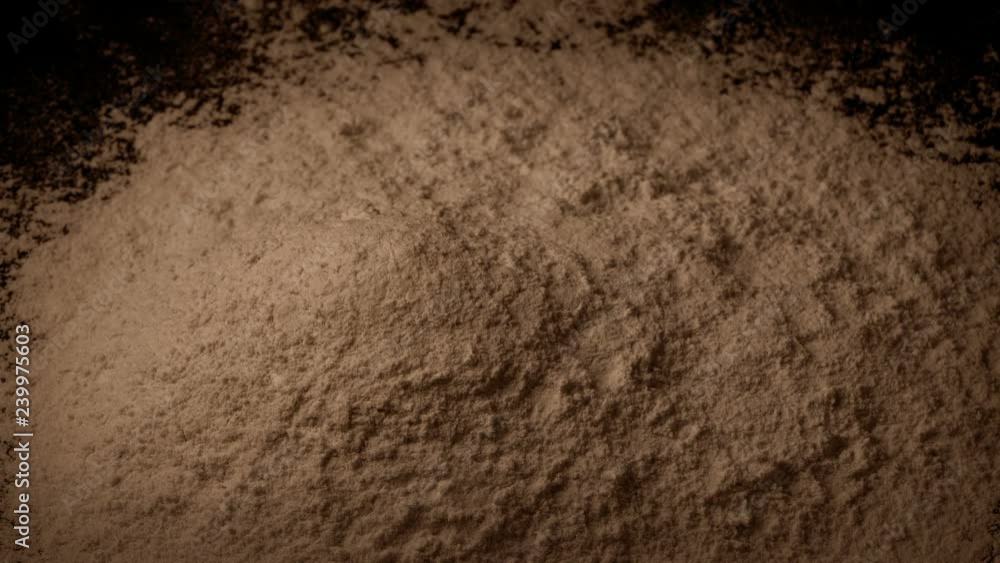 Brown Powder Is Poured Into Pile Brown Powder Is Poured Into Pile