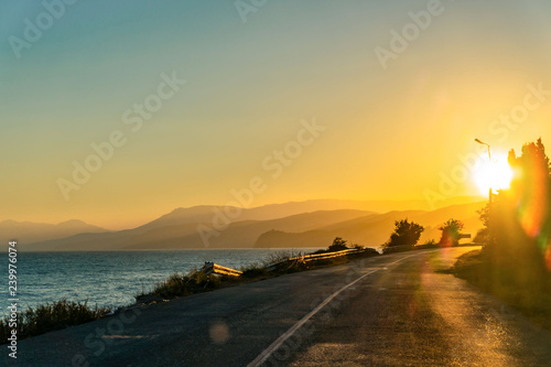 Coastal road in the Crimea at sunset. © Photoillustrator