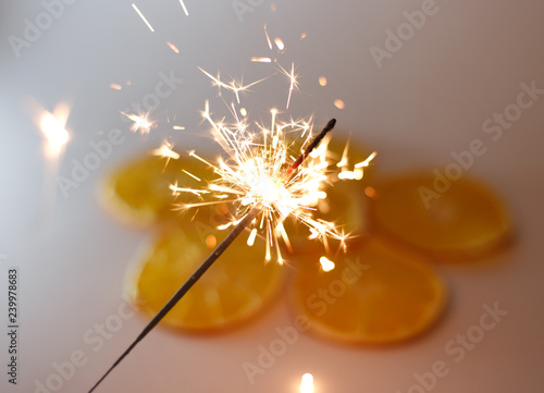 New Year s sparkler on a white background. Celebration