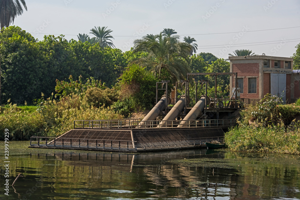 Landscape view of large pumping station on river nile in Egypt Landscape view of large pumping station on river nile in Egypt