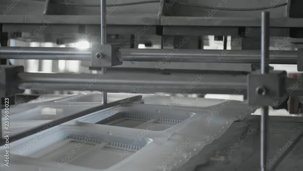 Plastic lunch boxes manufacture plant, disposable food package ware production line. Work on high performance automated machinery. Container for lunch sets for supermarket, railway or airline company Plastic lunch boxes manufacture plant, disposable food package ware production line. Work on high performance automated machinery. Container for lunch sets for supermarket, railway or airline company