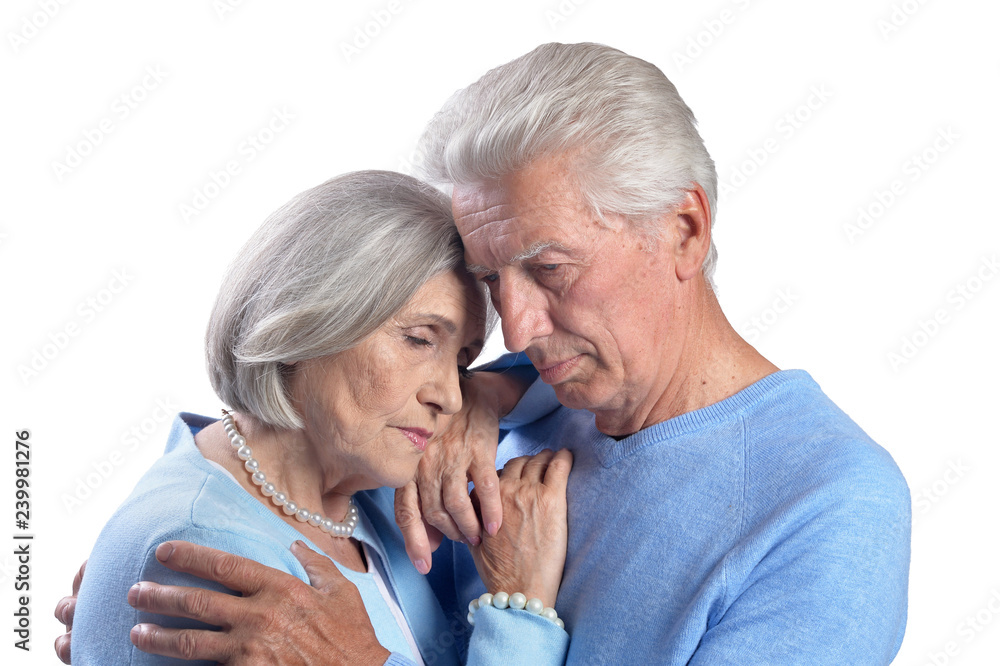 Close up portrait of sad senior couple hugging Close up portrait of sad senior couple hugging