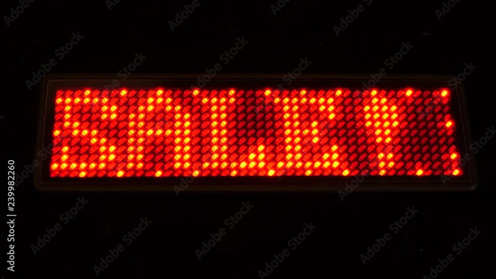 The word 'SALE!' in red LED display. The word 'SALE!' in red LED display.
