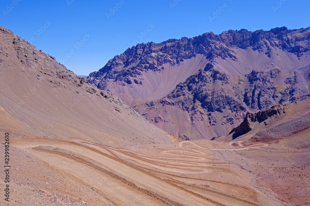 Old dangerous mountain road of the Paso de la Cumbre or Cristo Redentor in the Andes between Argentina and Chile