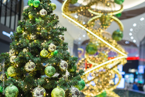 a decorated Christmas tree in the mall