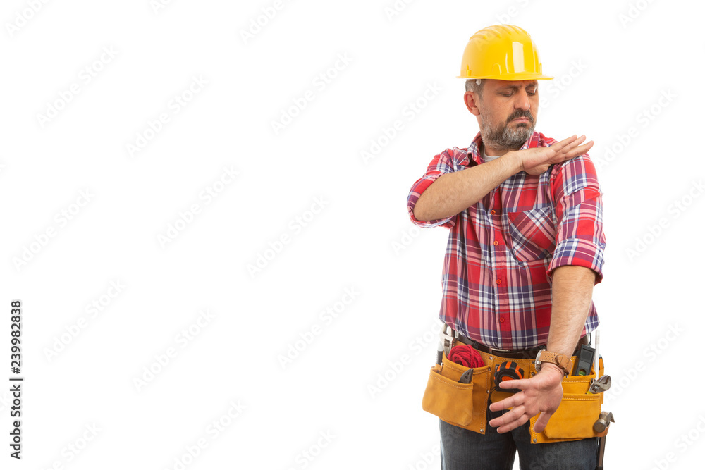 Builder cleaning shoulder as getting ready. Builder cleaning shoulder as getting ready.