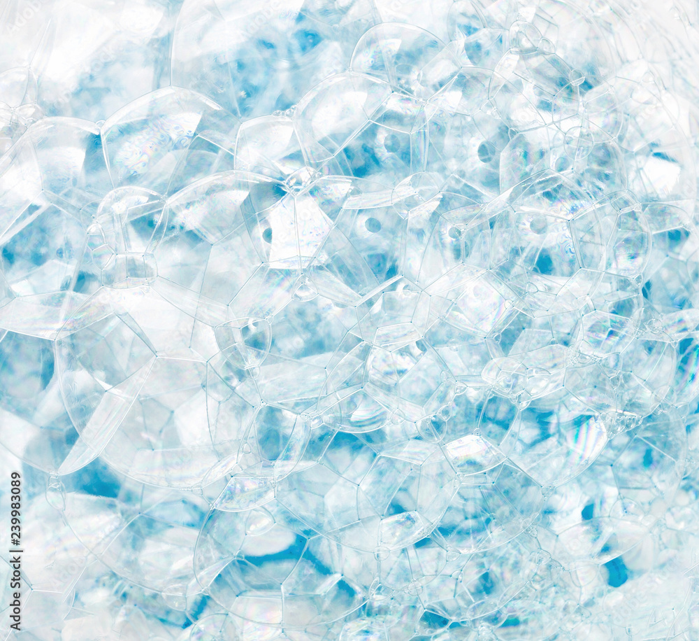 Abstract background of blue soap bubbles. Concept of cleansing