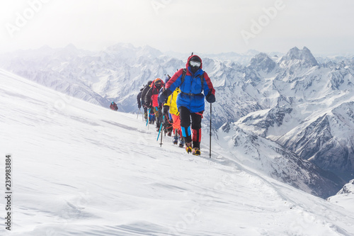 A group of climbers goes to a meeting high in the mountains.