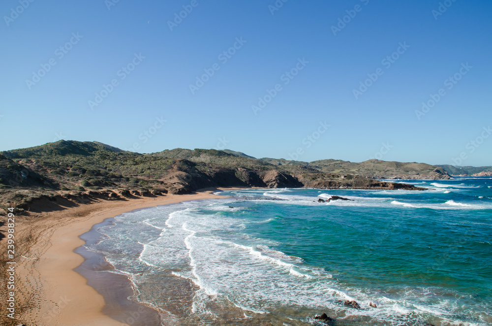 Landscape photography of one of the beaches of Menorca from a ravine.