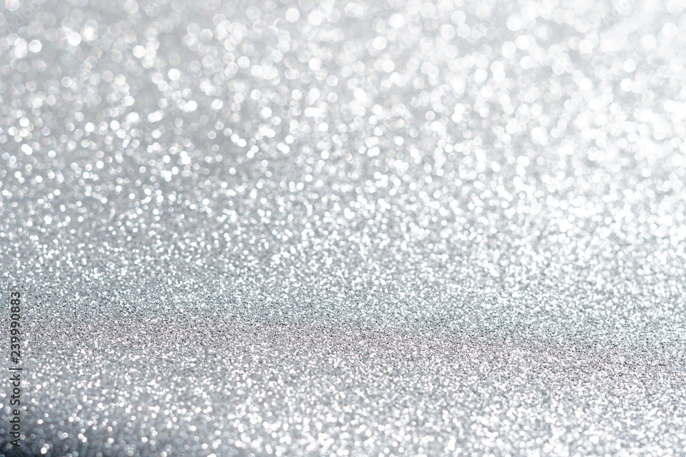 Obraz premium Silver and white glitter abstract bokeh background Christmas