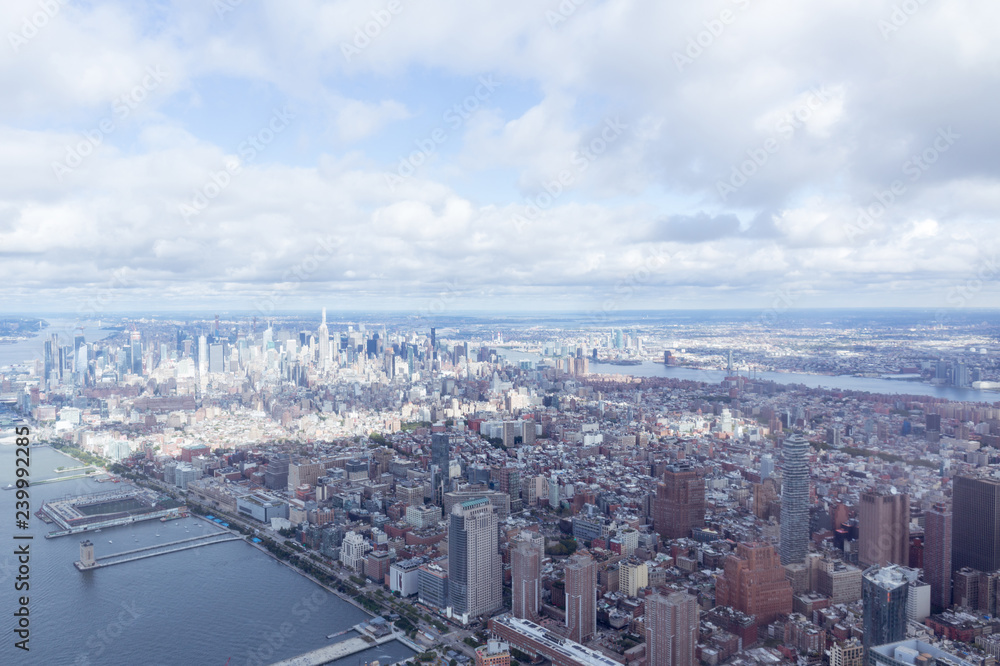 aerial view of new york city skyscrapers and cloudy sky, usa
