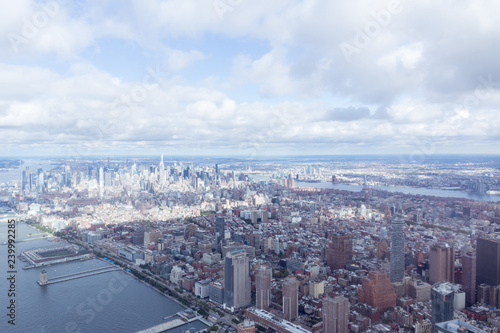 aerial view of new york city skyscrapers and cloudy sky, usa © LIGHTFIELD STUDIOS