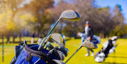 Golf Clubs and Balls on a Golf Course photo