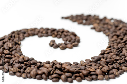 brown coffee beans on a white background