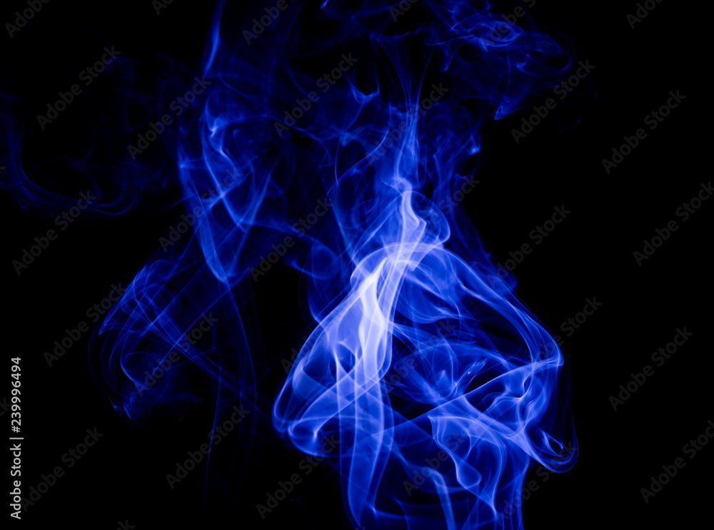 Obraz premium Blue smoke on black background