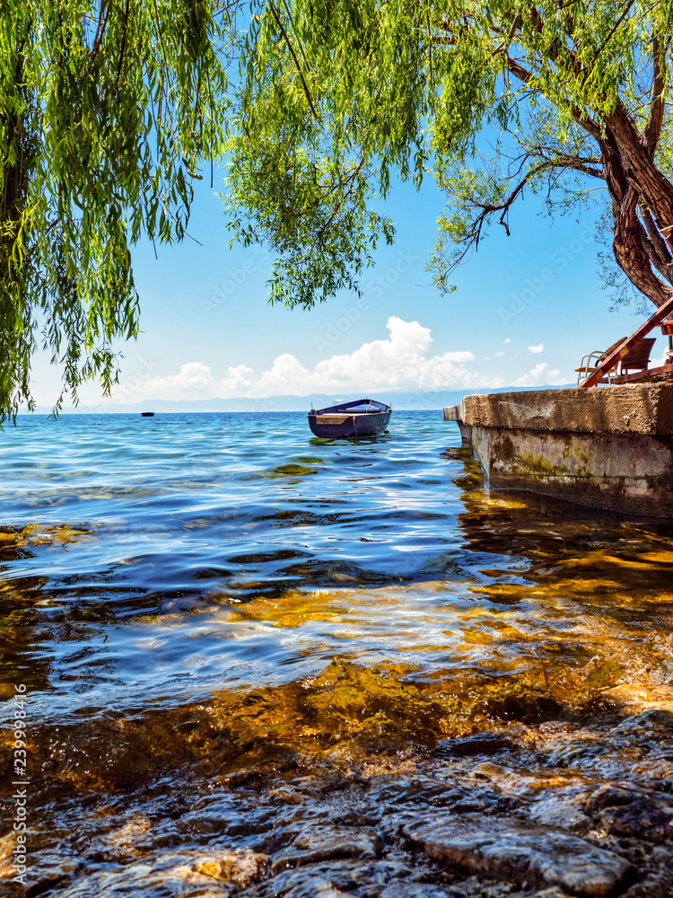 Boat on Ohrid lake in a beautiful summer day