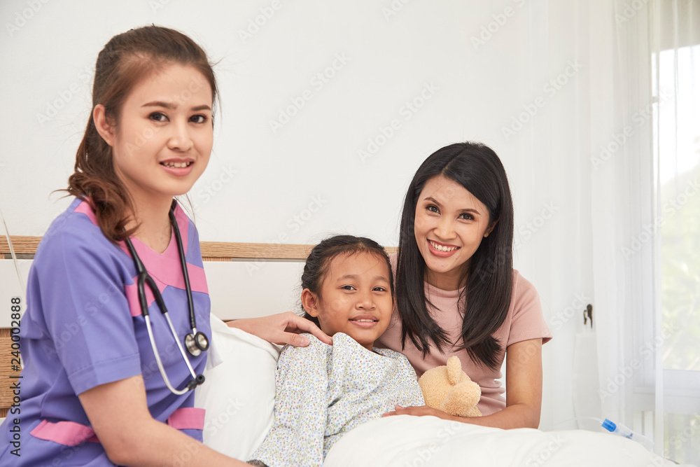 Doctor and child with mother in hospital Doctor and child with mother in hospital