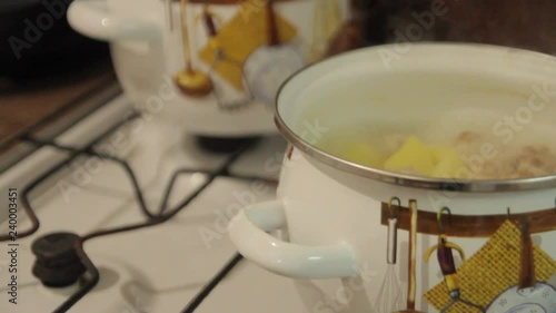 Wallpaper Mural In the kitchen, boil potatoes with meat. Close-ups Torontodigital.ca