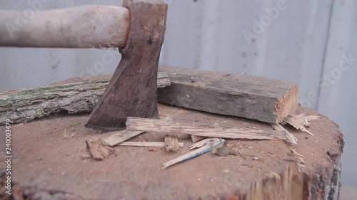 Wallpaper Mural Ax hammered into a stump in the background of slate Torontodigital.ca