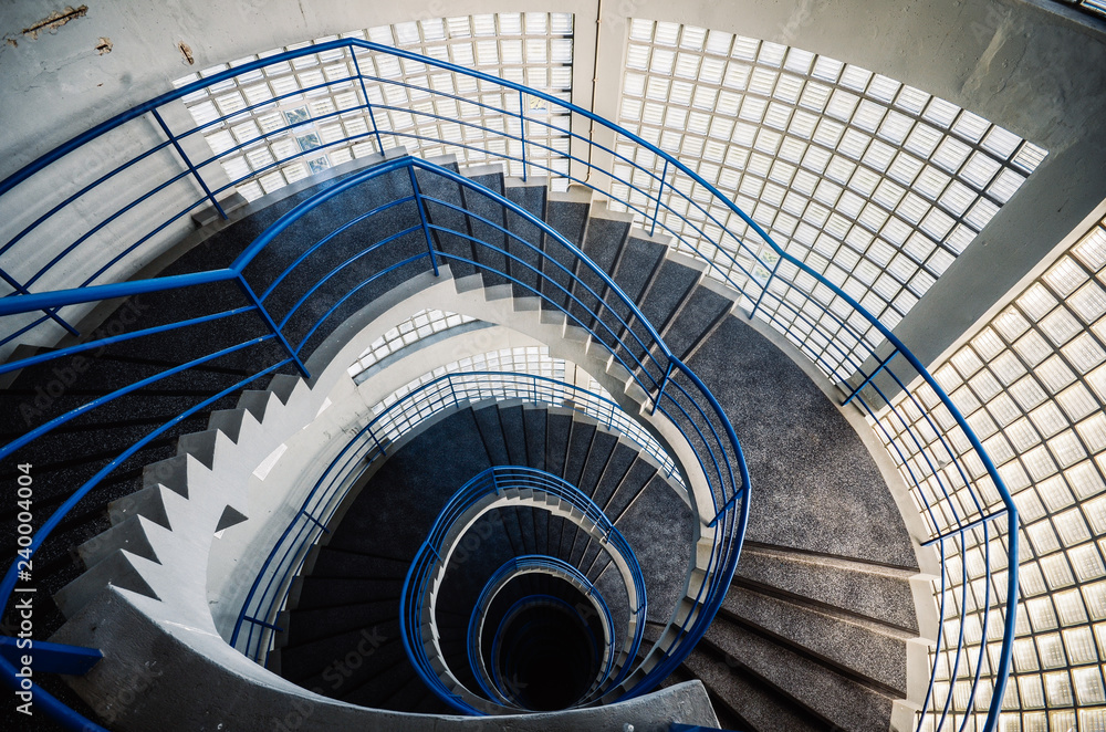 Beautiful and hypnotic spiral convoluted staircase, wide angle