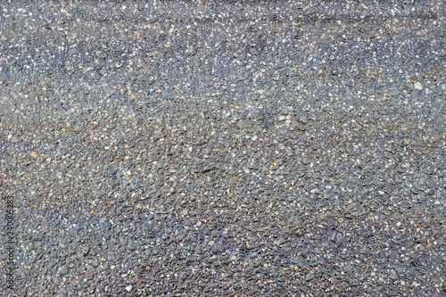 Wet asphalt pavement oil spill texture surface