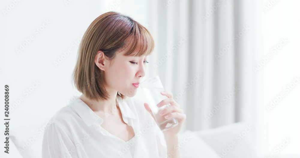 Beauty woman drink water happily Beauty woman drink water happily
