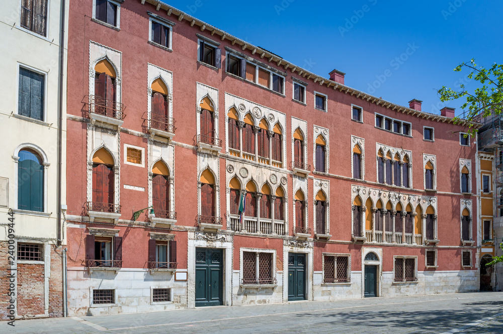 Traditional colorful red buildings of Venice