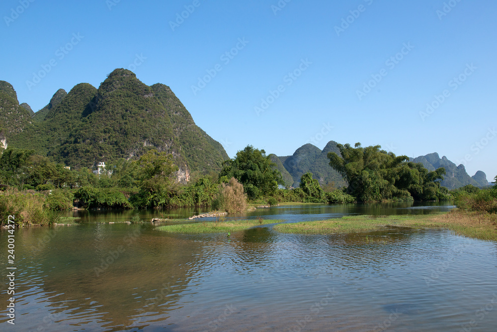 Karst mountains and limestone peaks of Yulong River, Yangshuo, Guilin, China