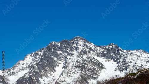 Peak of the mountain covered by snow, winter in Sochi, Russia. © Viacheslav