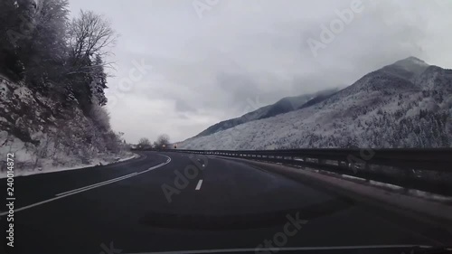 Driving on a snowy mountain road