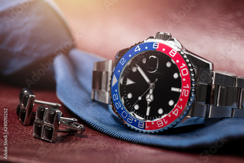 formal luxury men wristwatch with blue-red bezel