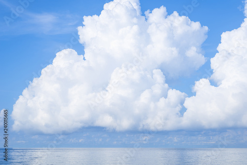 View of beautiful white clouds in a blue sky blue sea on sunny day with cloudy sky over it.