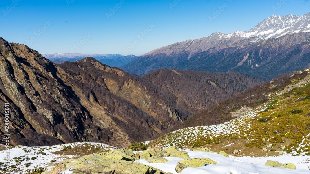 Peak of the mountain covered by snow, winter in Sochi, Russia.