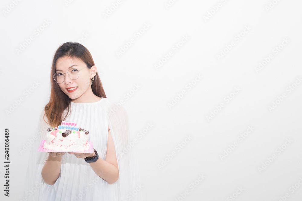 Birthday. Girls with a cake with candles,Young woman holding plate with tasty birthday cake . Birthday. Girls with a cake with candles,Young woman holding plate with tasty birthday cake .