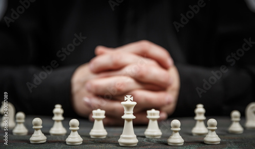 Wallpaper Mural Clasped hands planning strategy with chess figures Torontodigital.ca