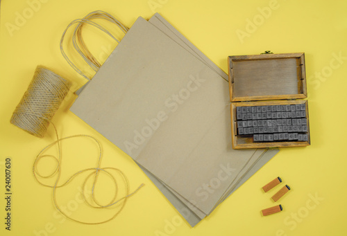 mini stamps and packaging bags for applying the brand on a yellow background